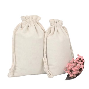 Sac à cordon en toile de coton naturel personnalisé par le fabricant, pochette à cordon en calicot de coton beige avec cordon en coton - Product Image 1