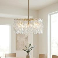 Lustre en laiton de style minimaliste moderne avec pendentif en coquillages tissé à la main pour le salon et la salle à manger