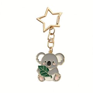 Lindo Llavero con Colgante de Animalitos de Dibujos Animados: Koala, Patito, Nutria, Mapache y Pentagrama - Product Image 5