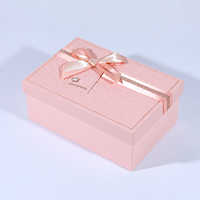 Boîte cadeau rigide rose personnalisée avec ruban, emballage cosmétique de luxe pour pots de crème de soin, impression de logo personnalisée