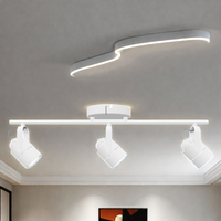 Éclairage sur rail fixe de conception commerciale moderne Source LED blanche noire Gu10 Interrupteur de contrôle d'atelier intérieur monté en surface en aluminium