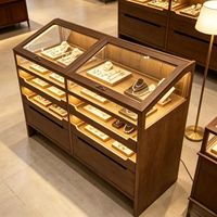 Vitrine murale pour bijoux avec éclairage LED en verre, design écologique et durable