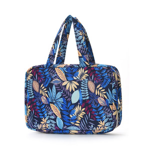 Bolsa de Cosméticos Resistente al Agua con Separación para Artículos Húmedos y Secos, Diseño Colgante, Plegable en Cuatro Partes, Portátil, para Viajes y Baño - Product Image 1