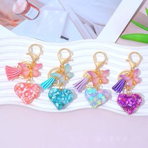 พวงกุญแจเรซิ่นรูปหัวใจคริสตัล ประดับพู่ห้อยผีเสื้อสุดหรู พวงกุญแจรูปหัวใจ จี้ห้อยกระเป๋าสำหรับ<span class=keywords><strong>สาว</strong></span>ๆ จี้ห้อยกุญแจรถ เครื่องประดั<span class=keywords><strong>บ</strong></span> - Product Image 5