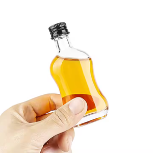 Botella de Vidrio Flint Redonda de 50 ml, Económica y Creativa, para Ginebra, Whisky, Brandy, Vodka y Otras Bebidas Alcohólicas, con Corcho - Product Image 3