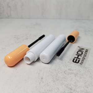 Vente en gros de contenants de mascara cylindriques brillants en ABS/PETG avec couvercle orange, tube à cils vide, emballage cosmétique personnalisé - Product Image 3