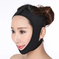 Masque facial amincissant respirant de haute qualité en forme de V avec sangle élastique pour le menton