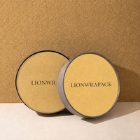 Boîte cadeau ronde rigide en papier personnalisée Lionwrapack avec couvercle doré et insert floqué noir