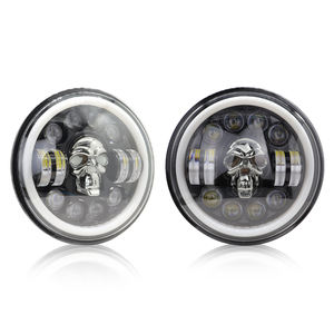 Phare LED Crâne 7 Pouces avec Anneau Halo Blanc/Jaune 75W 7500lm 6000K H4 pour Voitures Universelles et Wrangler - Product Image 1