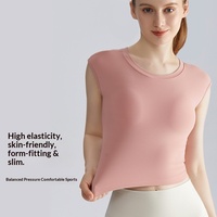 Camiseta sin mangas para yoga con almohadillas de sujetador integradas, de largo completo, que cubre el abdomen, de alta resistencia a impactos y con diseño trasero que realza la figura.
