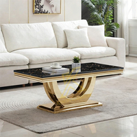 Table basse moderne en marbre doré de qualité supérieure avec structure en acier inoxydable, design populaire pour salon