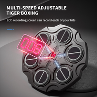 Vente en gros de jeu interactif pour enfants avec musique de boxe intelligente éclairée par LED Équipement d'entraînement de cible de boxe intelligent de haute qualité