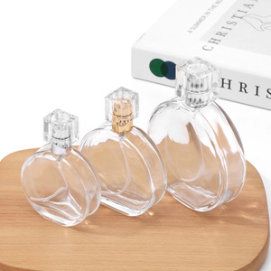 Flacon pulvérisateur de parfum en <span class=keywords><strong>verre</strong></span> rond de haute qualité, rechargeable, pour cosmétiques et soins de la peau, 30 ml, 50 ml, 100 ml, avec bouchon - Product Image 4
