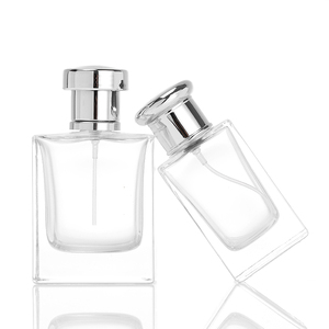 Customized 30ml 50ml square glass pump perfume bottle with luxurious silver lid