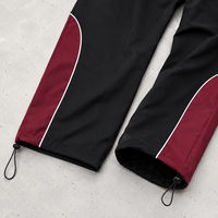 Survêtement de jogging en nylon réfléchissant avec logo personnalisé OEM, coupe-vent pour homme, ensemble en nylon avec bandes blanches pour homme
