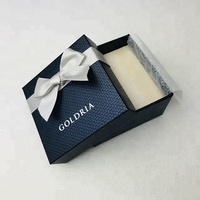 Boîte rigide en carton texturé écologique de luxe avec dorure à chaud et impression offset pour l'emballage de bijoux de mode