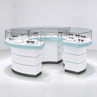 Vitrines optiques en verre blanc avec comptoir d'exposition, barre lumineuse, pieds en tube doré, protection en verre, CE ETL pour magasin d'optique