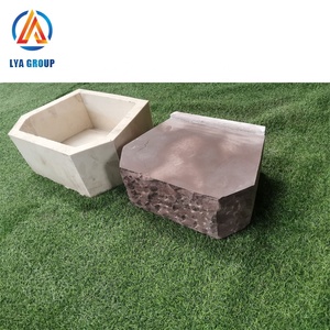 Retaining concrete wall block mold