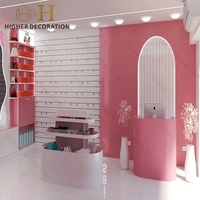 Meuble cosmétique sur mesure professionnel, design rose, vitrine de présentation de cosmétiques, comptoir de maquillage en bois pour la vente au détail