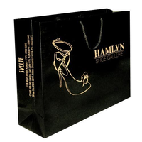 Vente en gros avec logo personnalisé feuille d'or de luxe en papier noir recyclable sacs d'emballage de cadeau shopping cosmétique maquillage bijoux avec logo