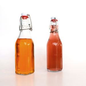 Vente en gros 250ml 500ml 750ml 1L Bouteille en verre transparent avec couvercle hermétique Swing Top Boissons Jus Bouteilles rondes en verre - Product Image 6