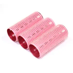 China online de venda de portáteis de alumínio rosa curlers rolos de cabelo com a auto aperto