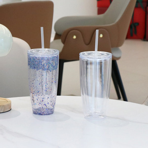 Vaso tipo globo de nieve de 20 oz, transparente, preperforado con pajita. - Product Image 1