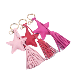 Llavero de cuero PU con logotipo personalizado, borla y estrella, accesorio para bolso, OEM, bajo MOQ, venta al por mayor - Product Image 1
