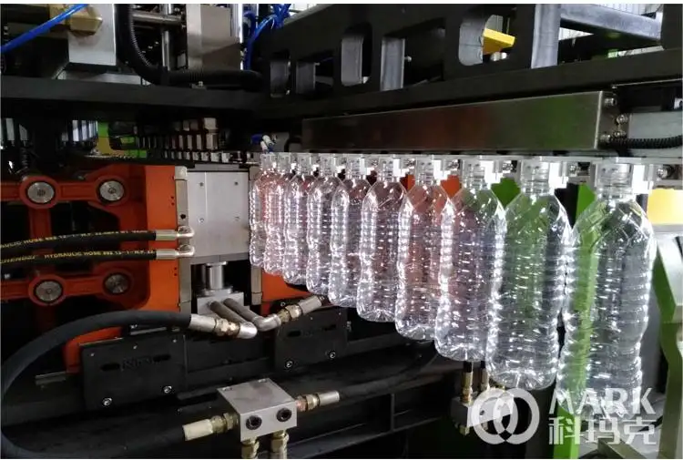 प्लास्टिक बोतल उड़ाने की मशीन/ब्लो मोल्डिंग मशीन/पानी की बोतल बनाने की मशीन