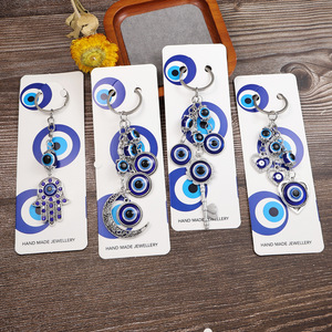 Nuovo Portachiavi con Piccolo Ciondolo a Forma di Palma, Elefante, Tacchino con Occhi Blu per Borsa e Auto - Product Image 1