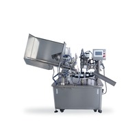 Machine automatique de remplissage et de scellage de tubes souples préformés pour crème cosmétique, pommade, dentifrice