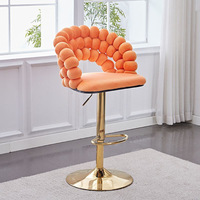 Tabouret de bar contemporain en fer forgé, design bulle, assise rembourrée orange, finition laiton, hauteur réglable, durable, pour cuisine et bar à domicile