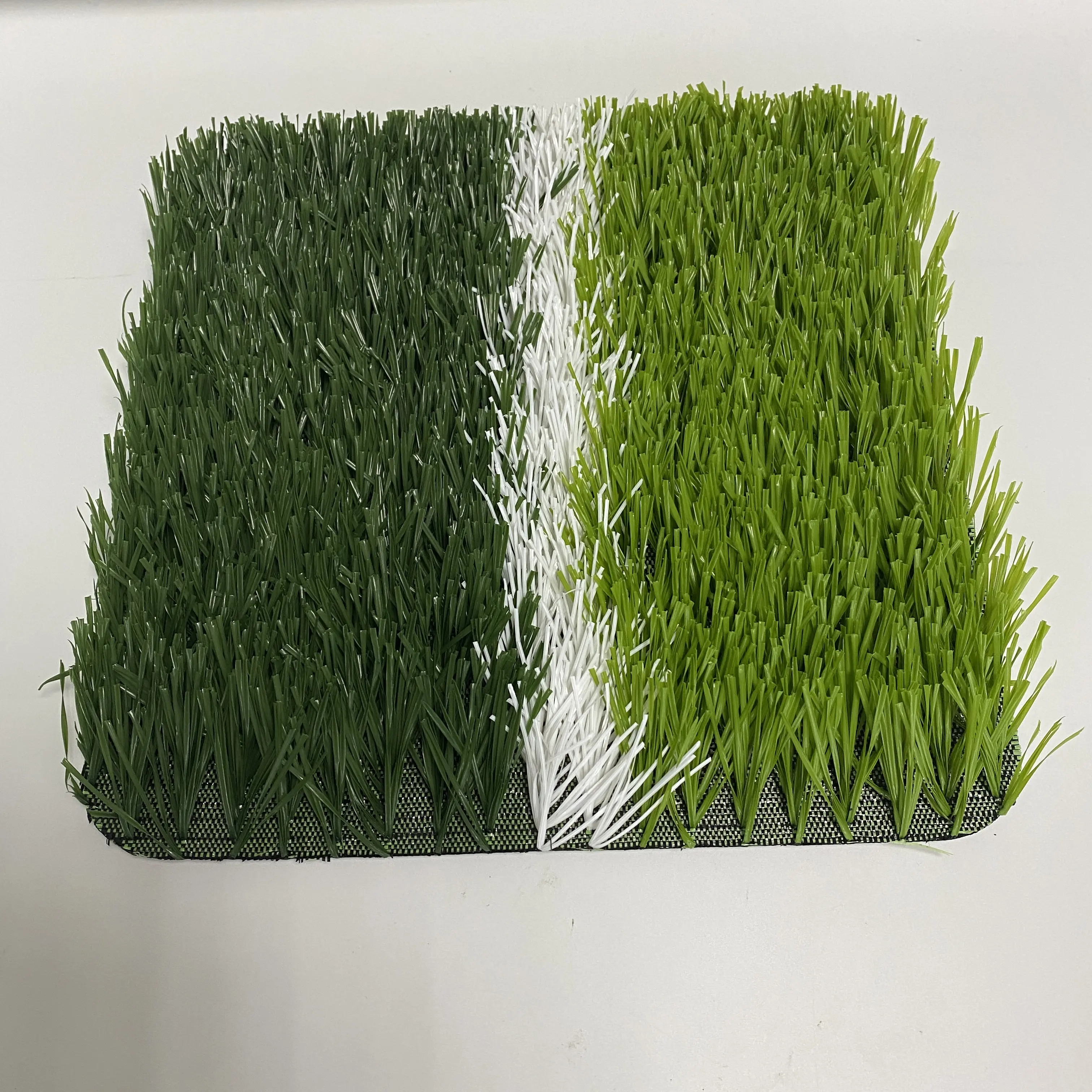 Césped artificial de pared verde, suelo deportivo de fútbol