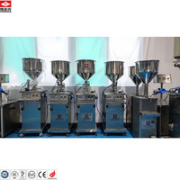 Machine de remplissage Machine de remplissage semi-automatique de bouteilles pet liquide manuli pneumatique