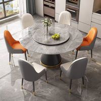 Vente en gros d'usine d'ensemble de table à manger extensible de style italien moderne table à manger ronde en acier inoxydable en marbre ensemble avec 4 chaises