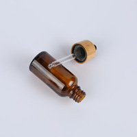 Flacon compte-gouttes en verre ambré transparent de 30 ml avec bouchon en bambou pour emballage cosmétique et huiles essentielles