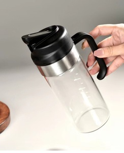 Botella dispensadora <span class=keywords><strong>de</strong></span> <span class=keywords><strong>aceite</strong></span> <span class=keywords><strong>de</strong></span> <span class=keywords><strong>oliva</strong></span> <span class=keywords><strong>de</strong></span> vidrio <span class=keywords><strong>de</strong></span> borosilicato <span class=keywords><strong>de</strong></span> alta calidad <span class=keywords><strong>de</strong></span> 500 ml al por mayor - Apertura y cierre automático 2 en 1 con boquilla antiderrame y tapa antipolvo - Product Image 2