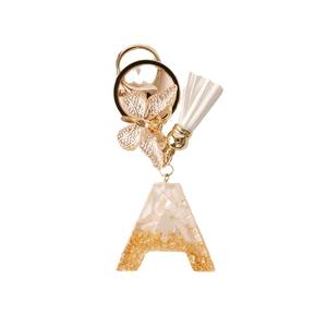 Llavero Colgante Clásico Inglés con Diseño de Borla y Mariposa, Abrebotellas de Plástico Dorado Impermeable, con Concha Blanca y Resina, para Navidad - Product Image 5