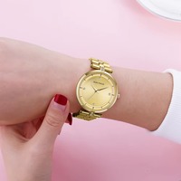 Montre à quartz pour femme avec cadran rond, bracelet en métal, marqueurs décoratifs en cristal, montre-bracelet analogique minimaliste pour un usage quotidien
