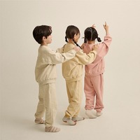 Corée enfants printemps garçons et filles version ample à capuche ensemble enfants mode patchwork col rond couleur unie costume de loisirs