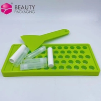 Ensemble de spatules vertes en gros kit de fabrication de baume à lèvres plateau de remplissage de tube de baume à lèvres en plastique