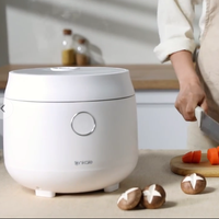 Cuiseur à riz électrique à écran tactile rond 3L avec couvercle détachable en acier inoxydable pour la cuisine domestique.