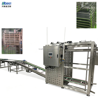 Système de manutention de chariots en acier inoxydable pour le chargement et le déchargement automatique de plateaux sur rayonnages industriels pour ligne de production de boulangerie