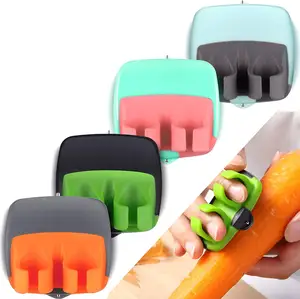 库存定制标志迷你便携式不锈钢手指去皮器，用于土豆蔬菜和水果