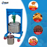 Handmatige honingpersmachine, fruitsapcentrifuge met 304 roestvrijstalen mand en universele wielen voor het persen van druiven en fruit.