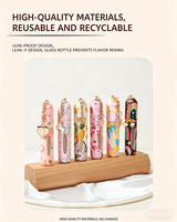 Atomiseur de parfum miniature de luxe 5 ml avec de jolis charms de dessins animés, impression florale personnalisée sur le dessous, flacon de parfum rechargeable