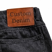 Jeans larges personnalisés pour hommes, 14 oz, noir délavé, panneaux superposés, découpes en maille effilochée, rivets, fabricant OEM