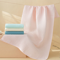 Serviette gaufrée 100% coton couleur unie en rose et bleu à séchage rapide 70*140 cm tissu de bain textile pour la maison vente en gros