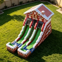 Château gonflable de Noël personnalisé en forme de maison de pain d'épices avec double toboggan