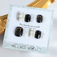 Vente en gros de faux ongles faits main de luxe en acrylique, couvrance totale 3D, courts, forme cercueil, motifs papillon et étoile, French manucure, haute qualité